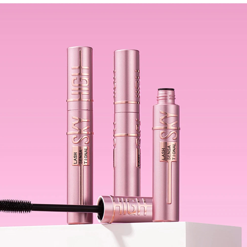 Pink mascara with visible brand name on a pink background